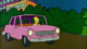 Homer Simpson in automobile.